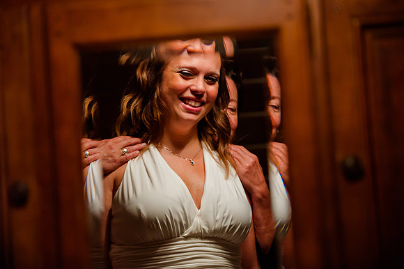 Mother and daughter share a moment at daughter's wedding