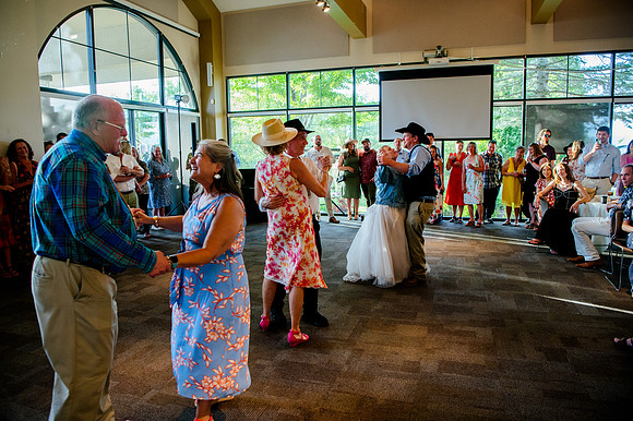 Celebrating Megan and Seth: A Festive Reception at River Oaks Golf Course