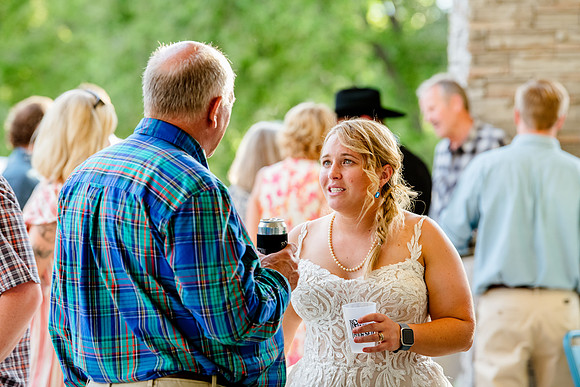 Celebrating Megan and Seth: A Festive Reception at River Oaks Golf Course