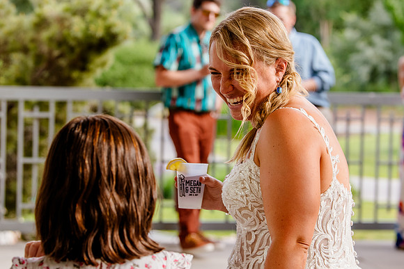 Celebrating Megan and Seth: A Festive Reception at River Oaks Golf Course