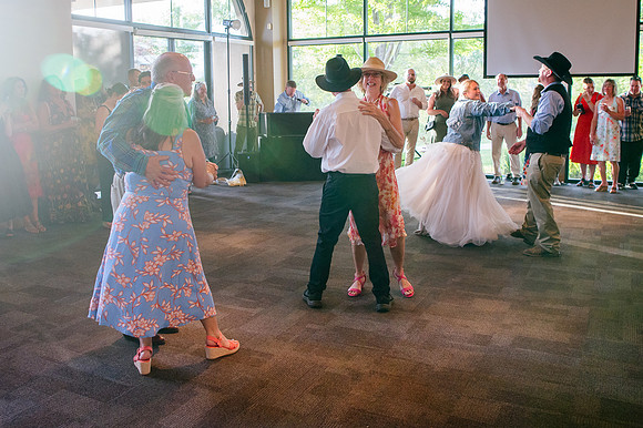 Celebrating Megan and Seth: A Festive Reception at River Oaks Golf Course