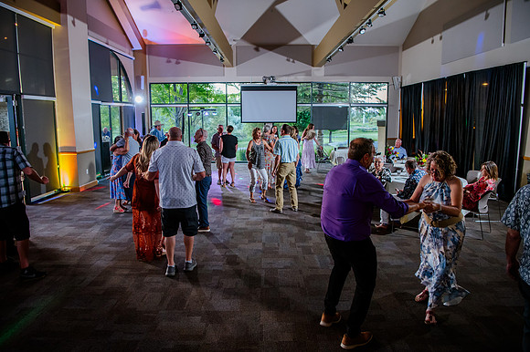 Celebrating Megan and Seth: A Festive Reception at River Oaks Golf Course