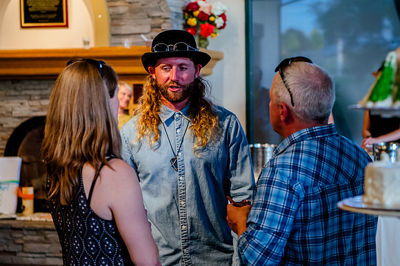 Celebrating Megan and Seth: A Festive Reception at River Oaks Golf Course