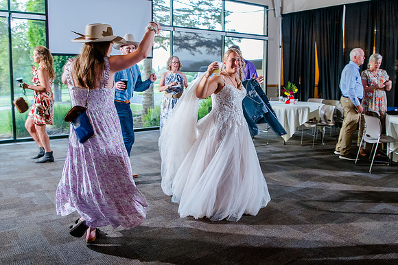 Celebrating Megan and Seth: A Festive Reception at River Oaks Golf Course