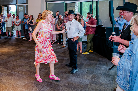 Celebrating Megan and Seth: A Festive Reception at River Oaks Golf Course