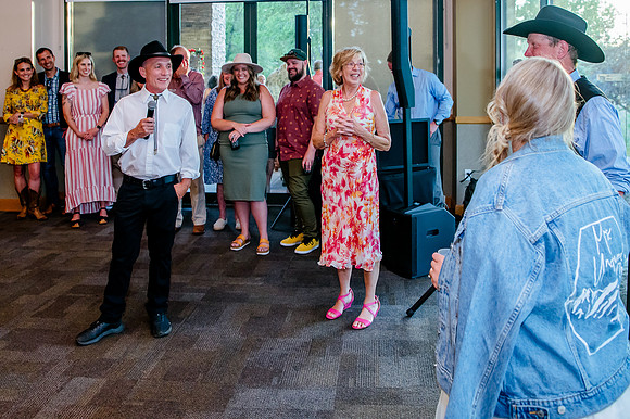 Celebrating Megan and Seth: A Festive Reception at River Oaks Golf Course