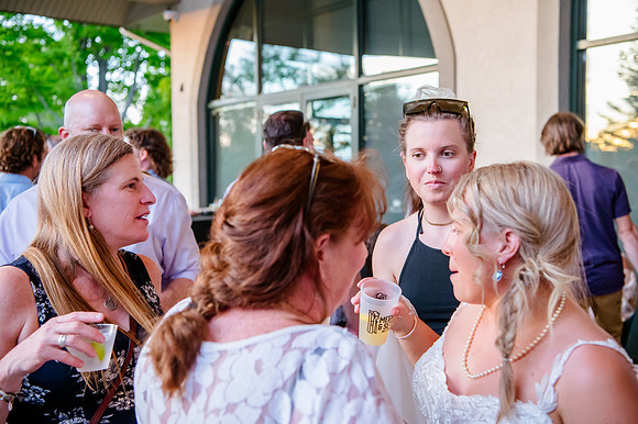 Celebrating Megan and Seth: A Festive Reception at River Oaks Golf Course