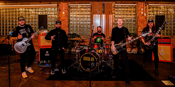 Heavy Metal Meets Classical Artistry: Phil Cannon's Birthday Soiree with 'Simian' at Publik