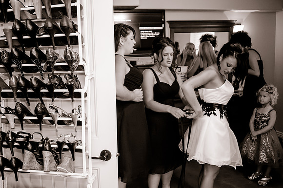 Bride getting ready with her shoe closet open
