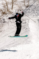 Groom on k2 pow skis mid air
