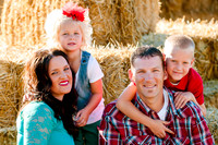 Family portrait-hay stack background