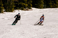 Bride and groom skiing in wedding dress and suit