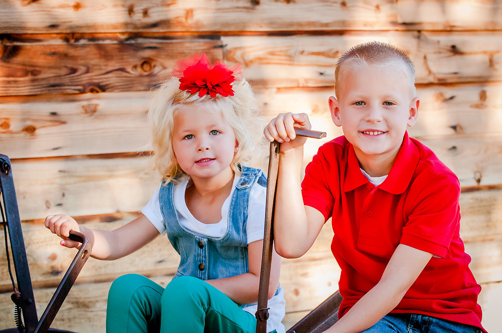 Kids on tractor portrait