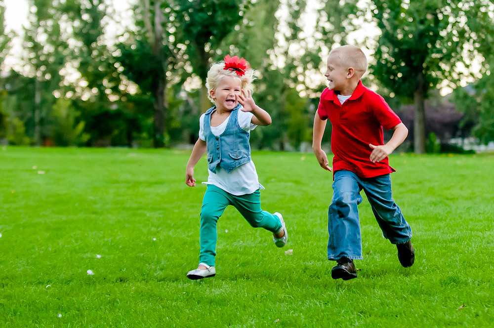 Kids running on grass
