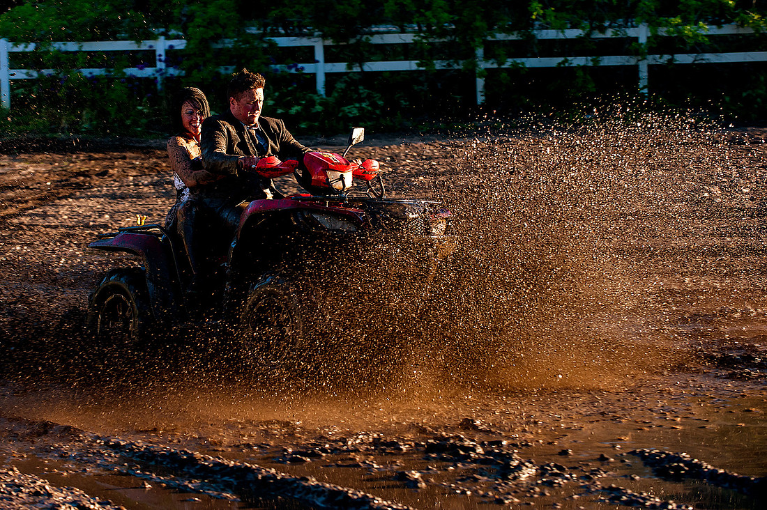 Bride and Groom hit mud wave