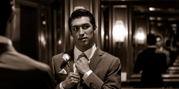 Snowbasin Wedding Inspiration groom getting ready in mirror