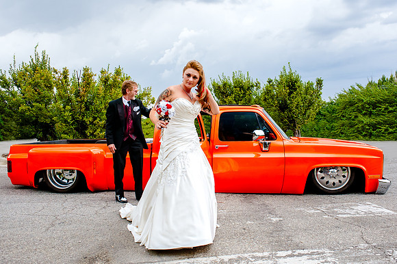 Grand wedding entrance from a lowerider bow tie