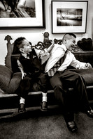 Kid getting slapped by brother at a wedding at Eccles Art Center in Ogden, Utah