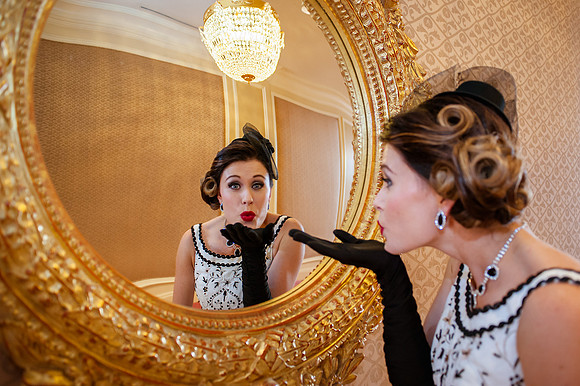 Blowing a kiss in the mirror at Grand America