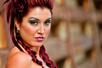 Gorgeous red haired bride stares into camera