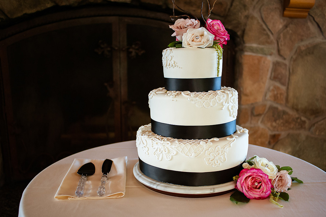 Snowbasin Wedding Inspiration-Curits-C-Cakes 3 tier wedding cake in front of fireplace.