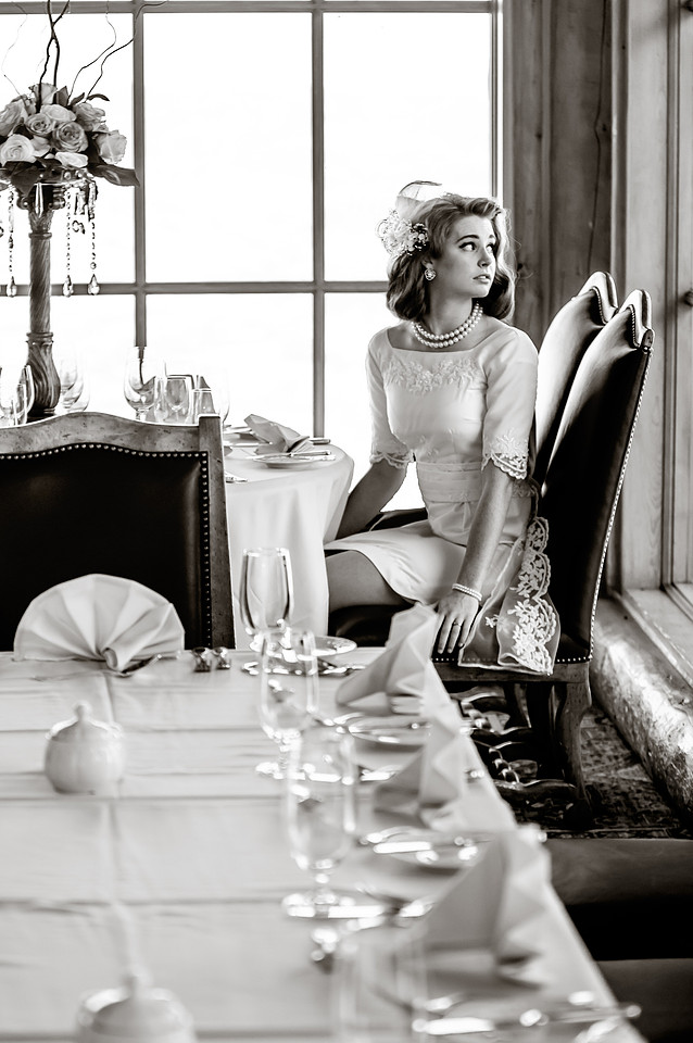 Snowbasin Wedding Inspiration-Black and white bride looks out the window.