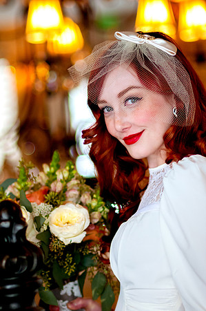 Red headed bride with soft bokeh background