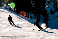 Wasatch adaptive sports staff Laura and Josh skiing Snowbird